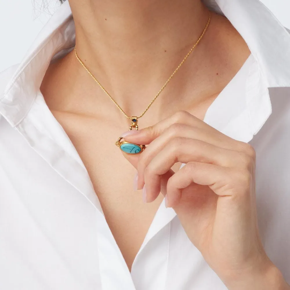 wedjat_eye_scarab_spinning_pendant_necklace_4.webp Wedjat Eye Scarab Spinning Pendant Necklace*The Met Store Best